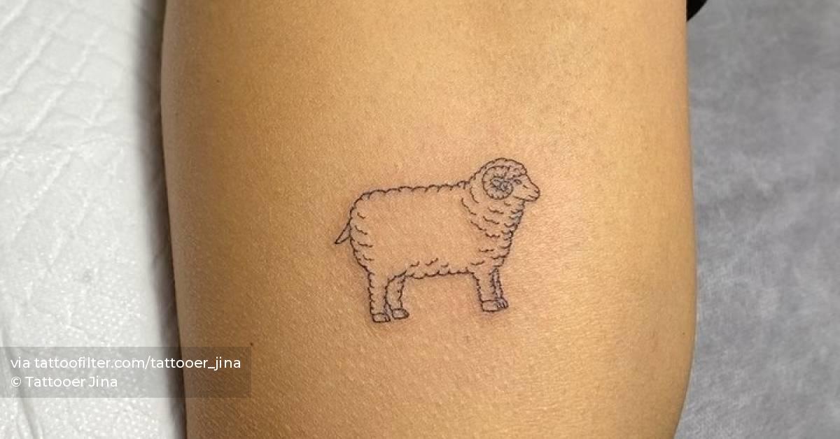 Fine line ram tattoo on the inner arm