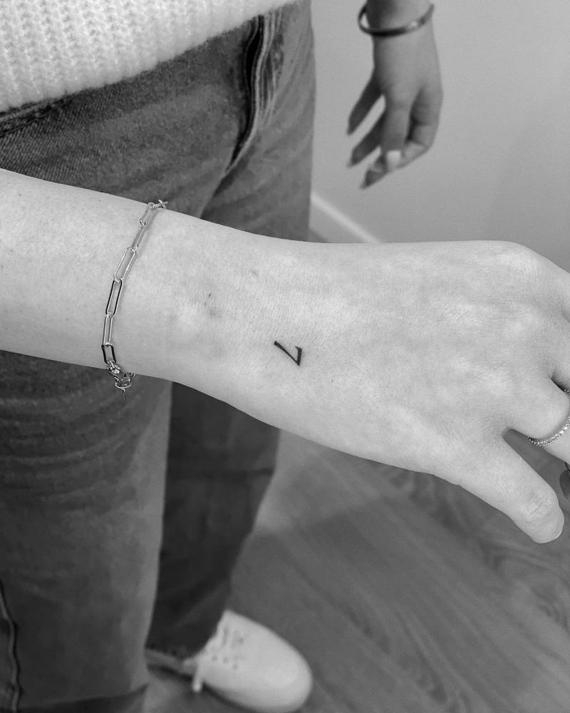 Minimalistic Number 7 Tattoo Located On The Hand   L 