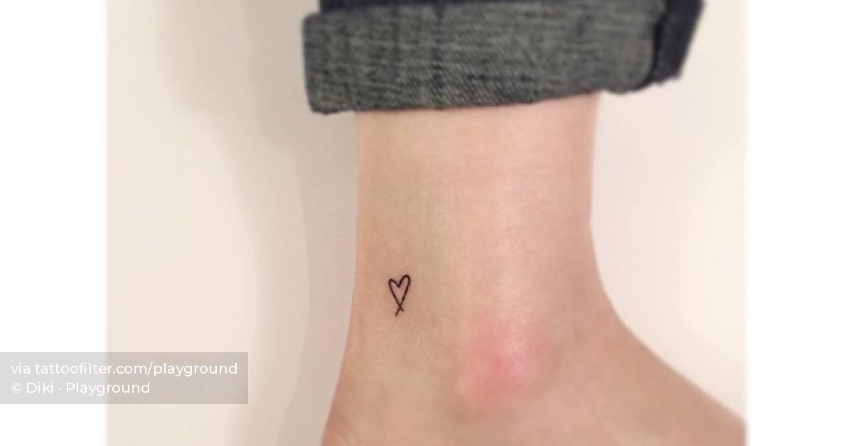 Tiny heart tattoo located on the ankle.