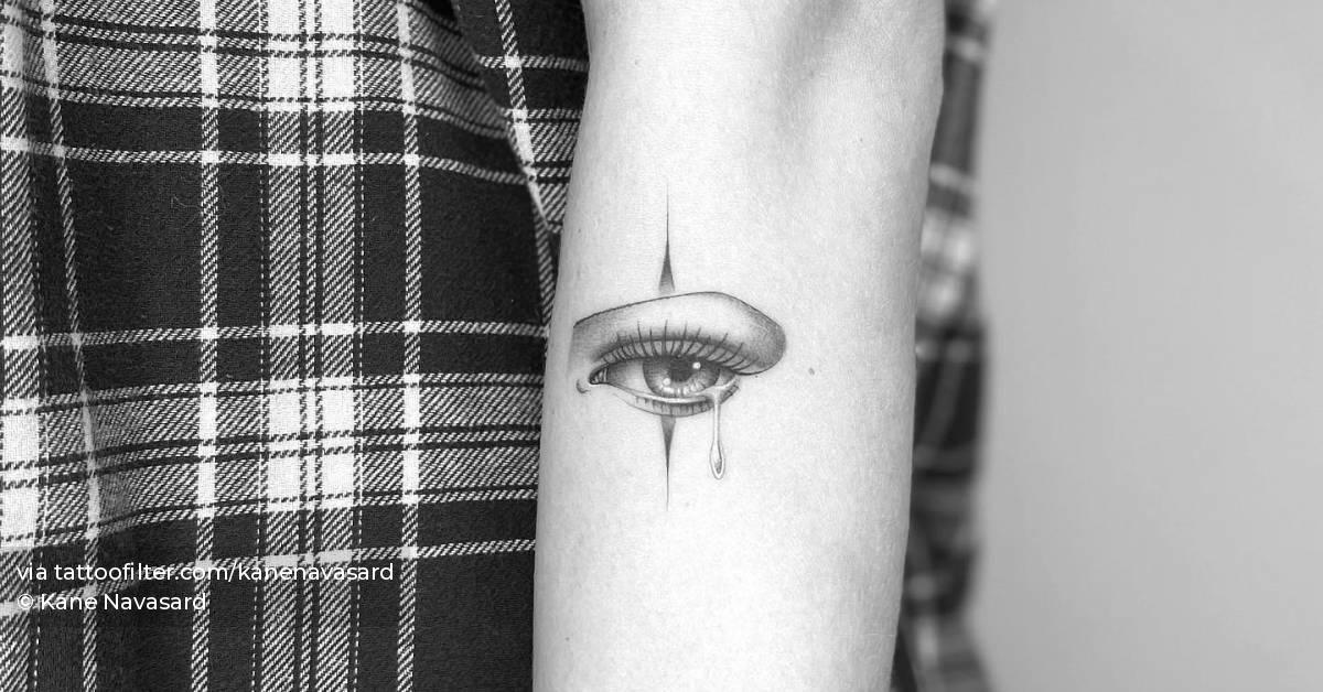 Freehand crying eye tattoo done on the forearm.