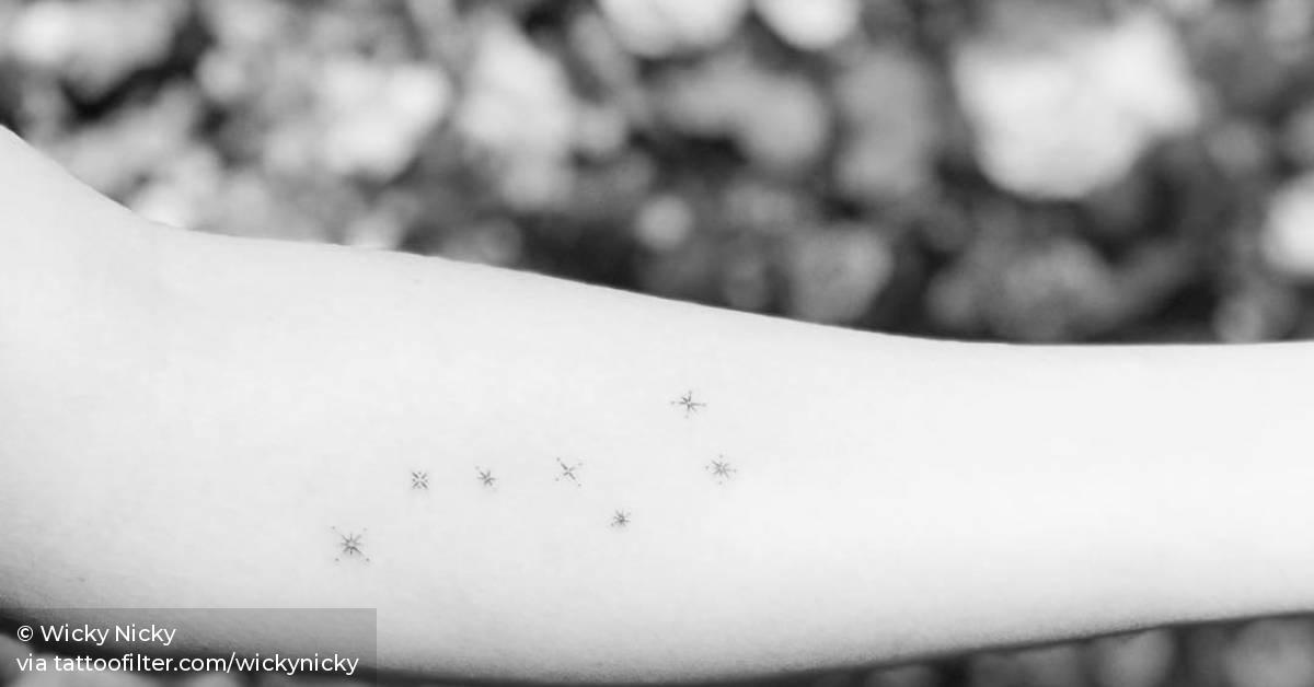 Big dipper tattoo on the left inner forearm.