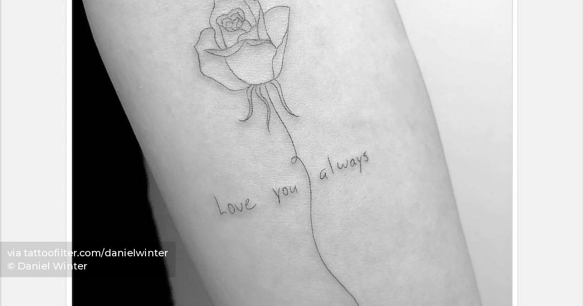Single needle rose tattoo located on the inner forearm.