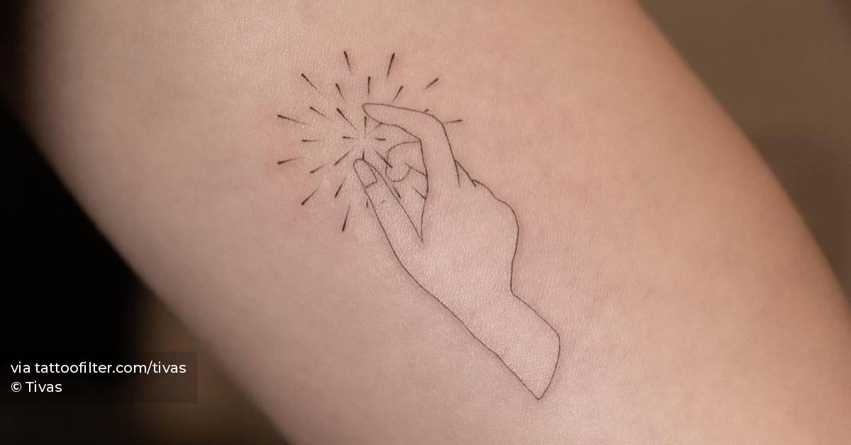 Fine line hand tattoo located on the inner arm.