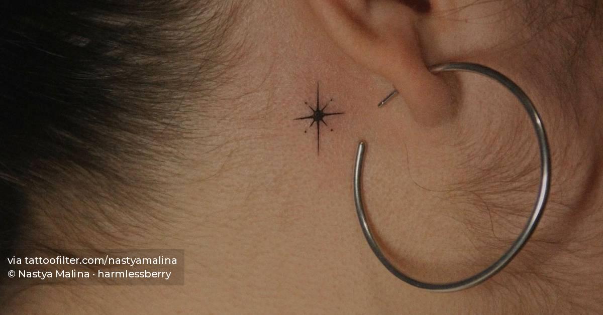 Minimalistic north star tattoo done behind the ear.