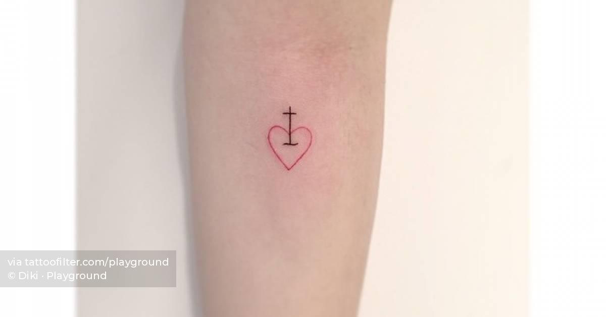 Minimalistic style red heart and cross tattoo located