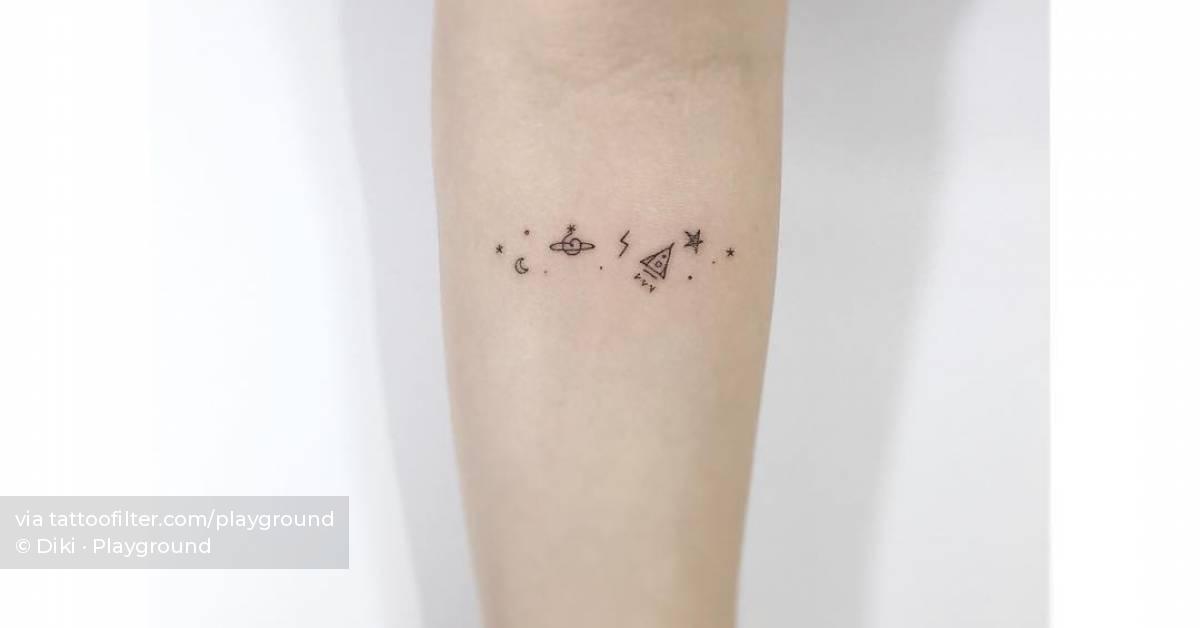 Minimalistic galaxy tattoo located on the inner