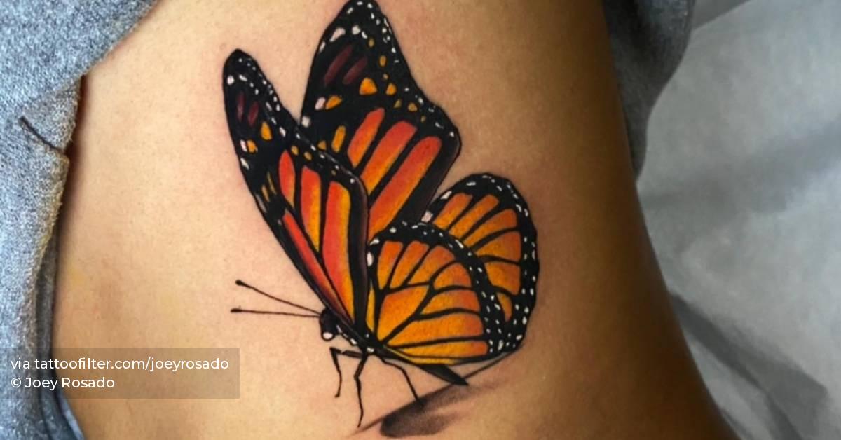 Monarch butterfly tattooed on the rib, illustrative