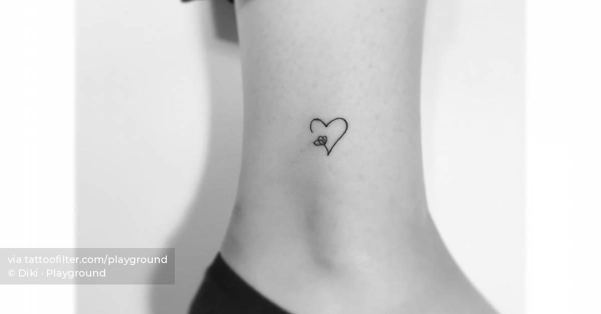 Heart flower tattoo located on the ankle, minimalistic