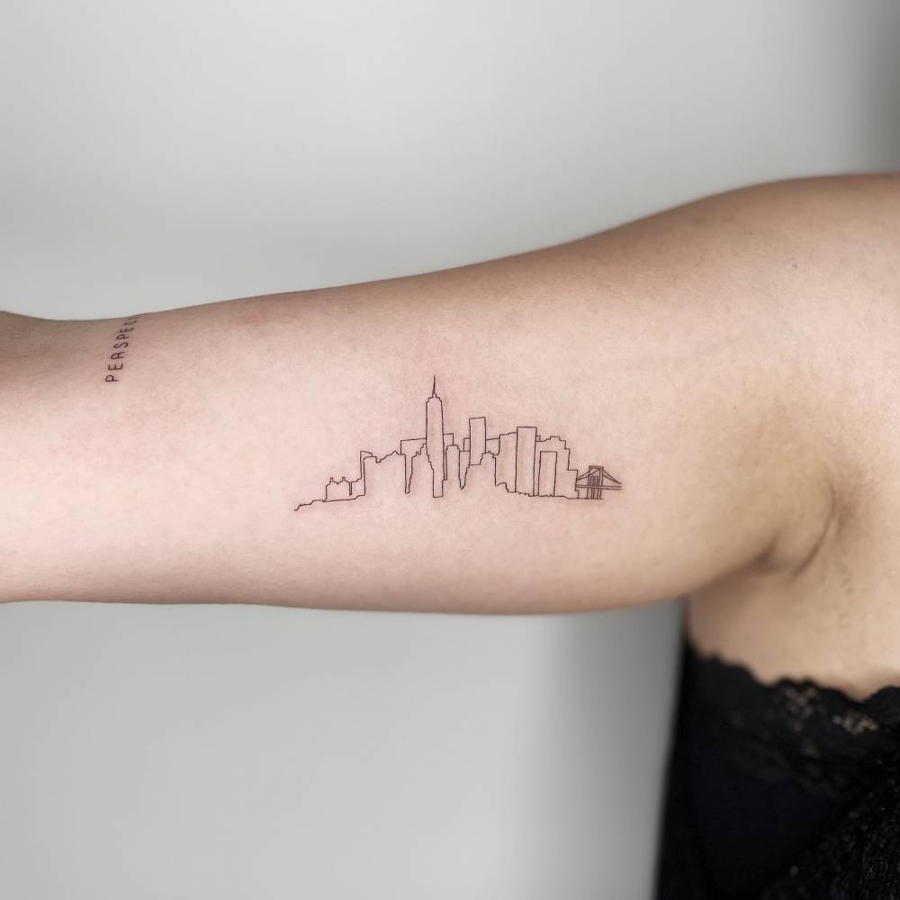 NYC Skyline Tattoo Located On The Inner Arm Fine Line