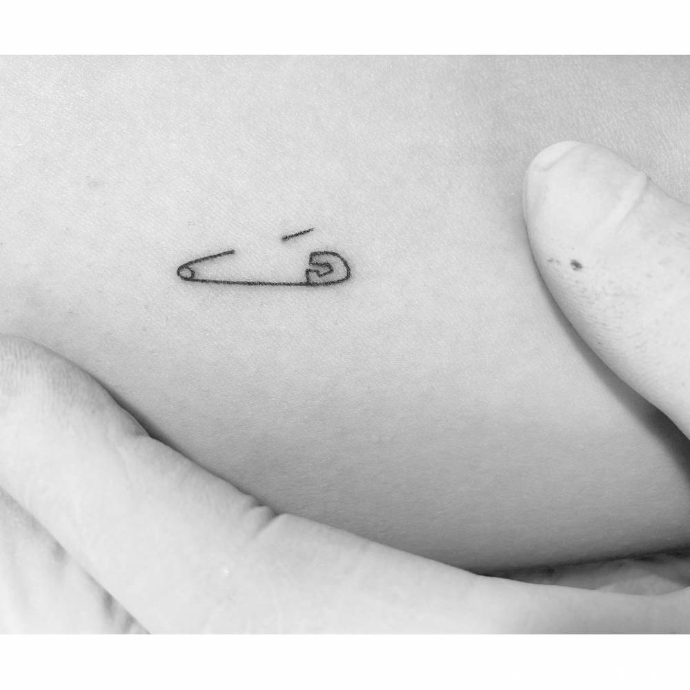 Minimalistic Safety Pin Tattoo Located On The Inner