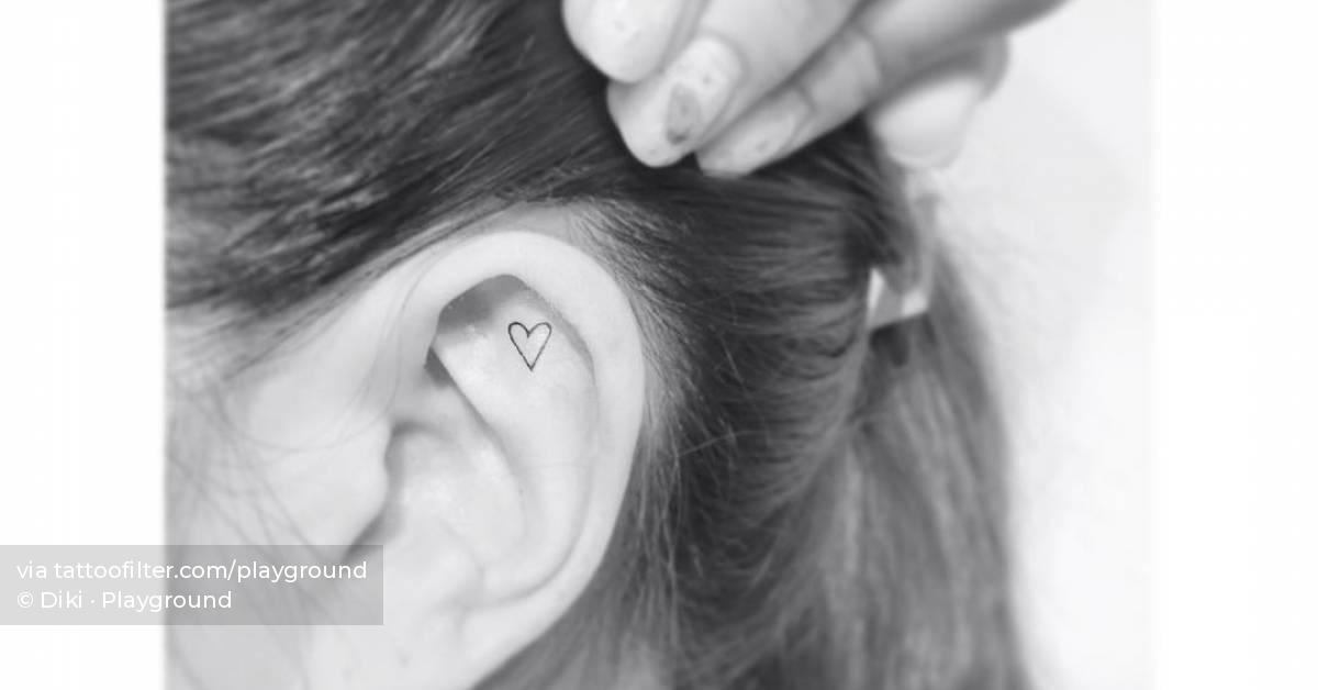 Tiny heart tattoo done on the ear 