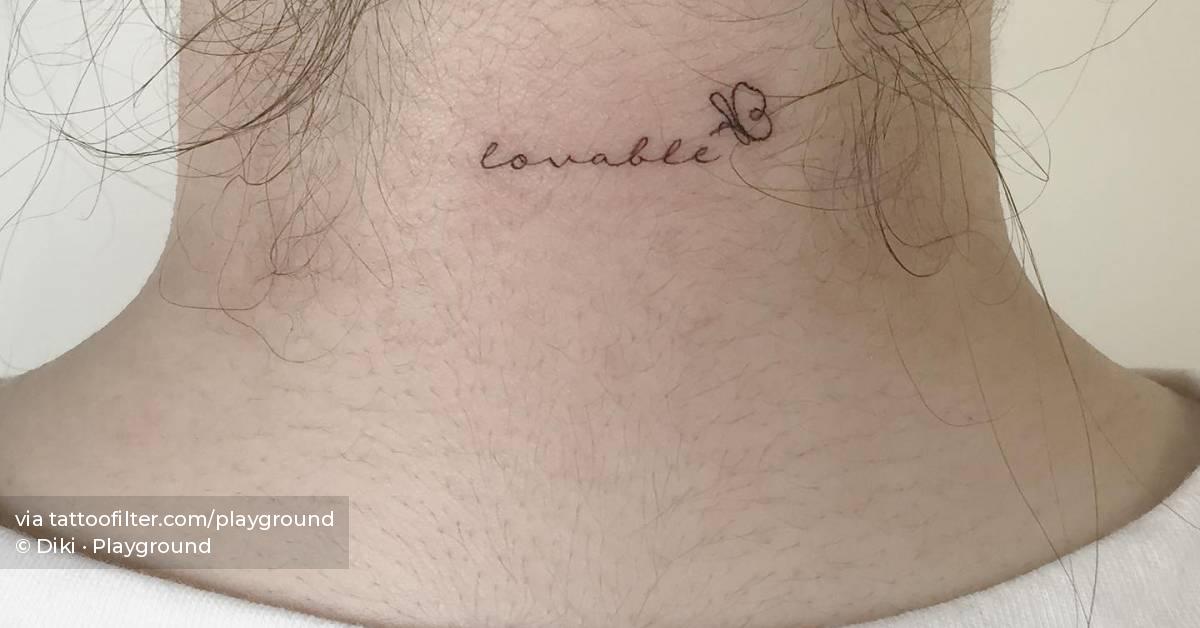 tattoo-of-the-word-lovable-and-a-tiny-butterfly