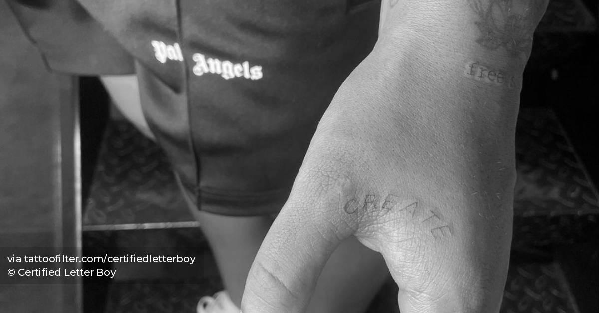 Tattoo of the word "create" located on Lauren James'
