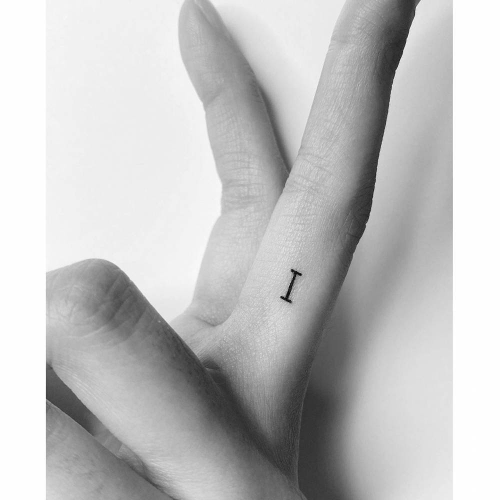 Letter I Tattoo Done On The Finger Minimalistic
