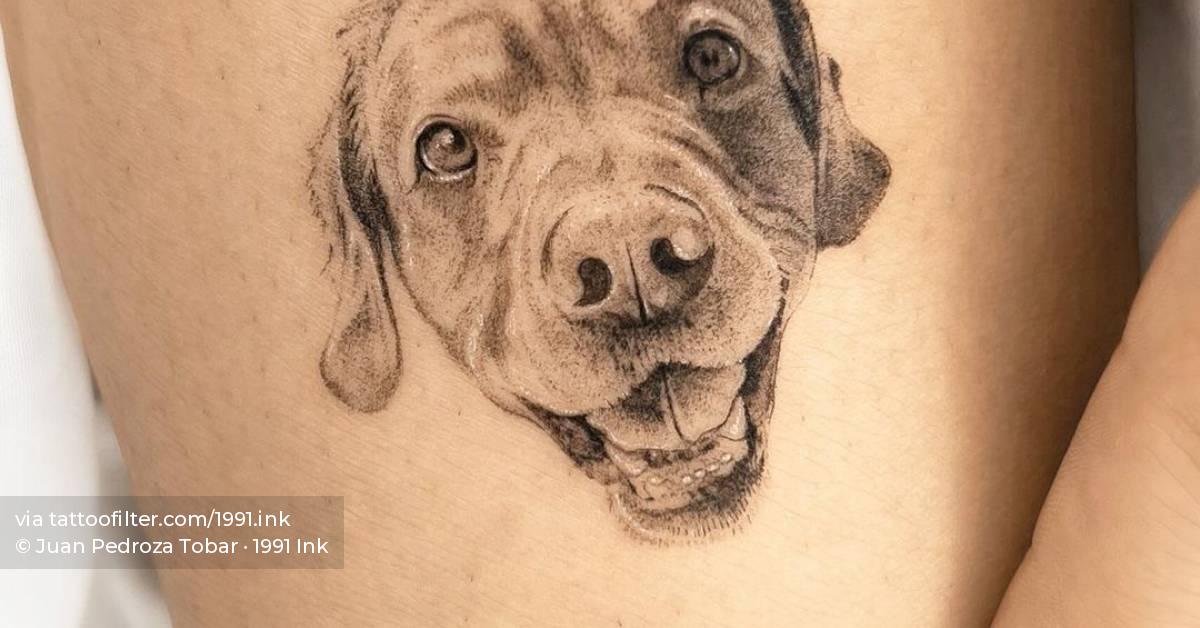Micro-realistic dog portrait tattoo located on the