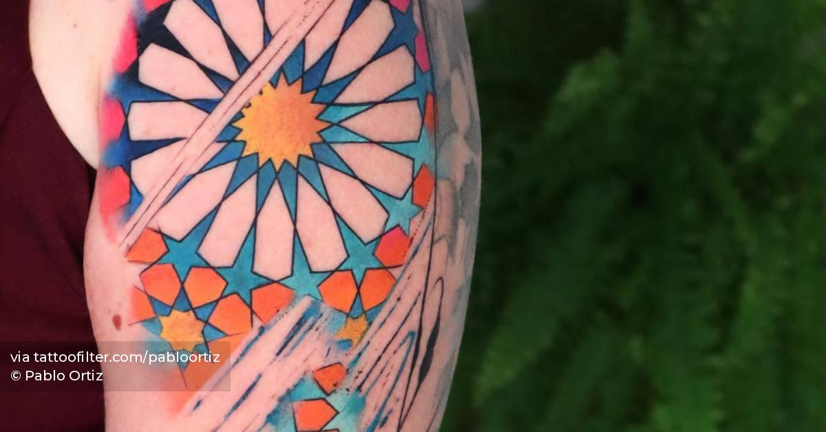 Alhambra tattoo located on the upper arm.