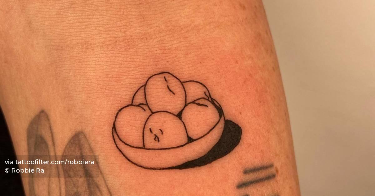 Hand poked fruit bowl tattoo located on the inner