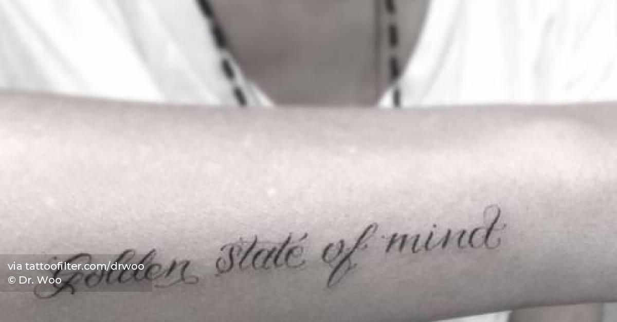 "Golden state of mind" lettering tattoo located on the