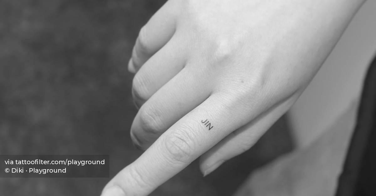 tattoo-of-the-name-jin-located-on-the-finger