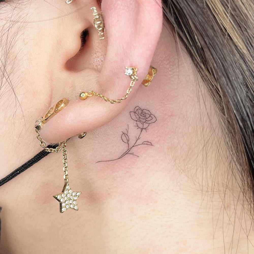 Fine Line Style Rose Tattoo Located Behind The Ear Fine Line Style Rose Tattoo Located Behind The Ear