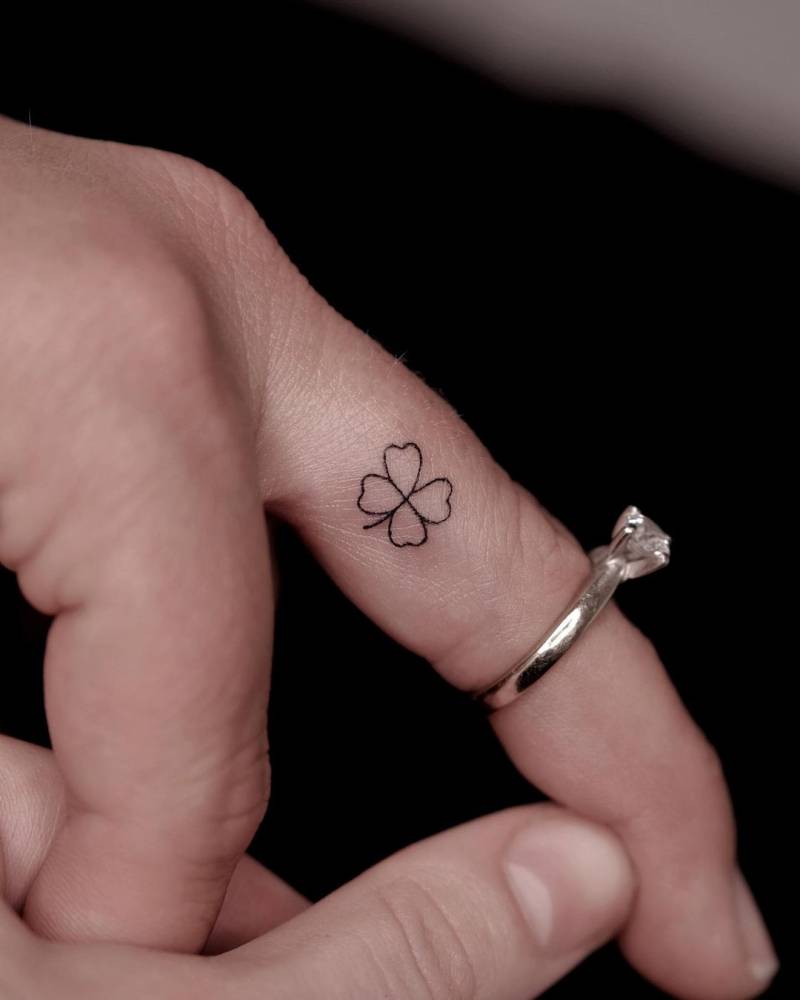 Tiny Minimalistic Four Leaf Clover Tattooed On The Tiny Minimalistic Four Leaf Clover Tattooed On The