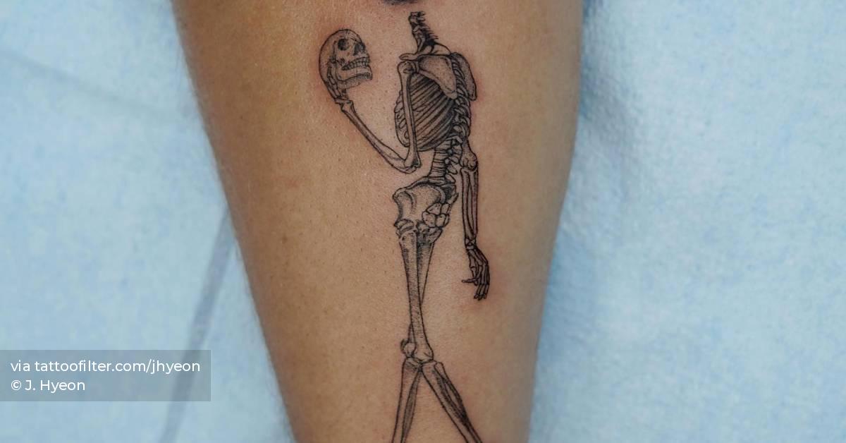 Skeleton tattoo located on the forearm, illustrative