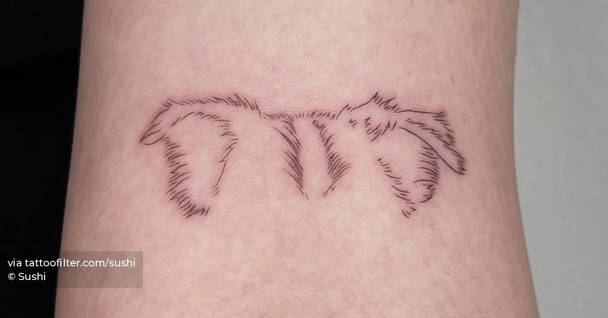 fine-line-style-dog-ears-tattooed-on-the-bicep