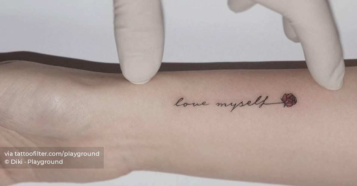 "Love myself" and red rose tattoo located on the wrist.