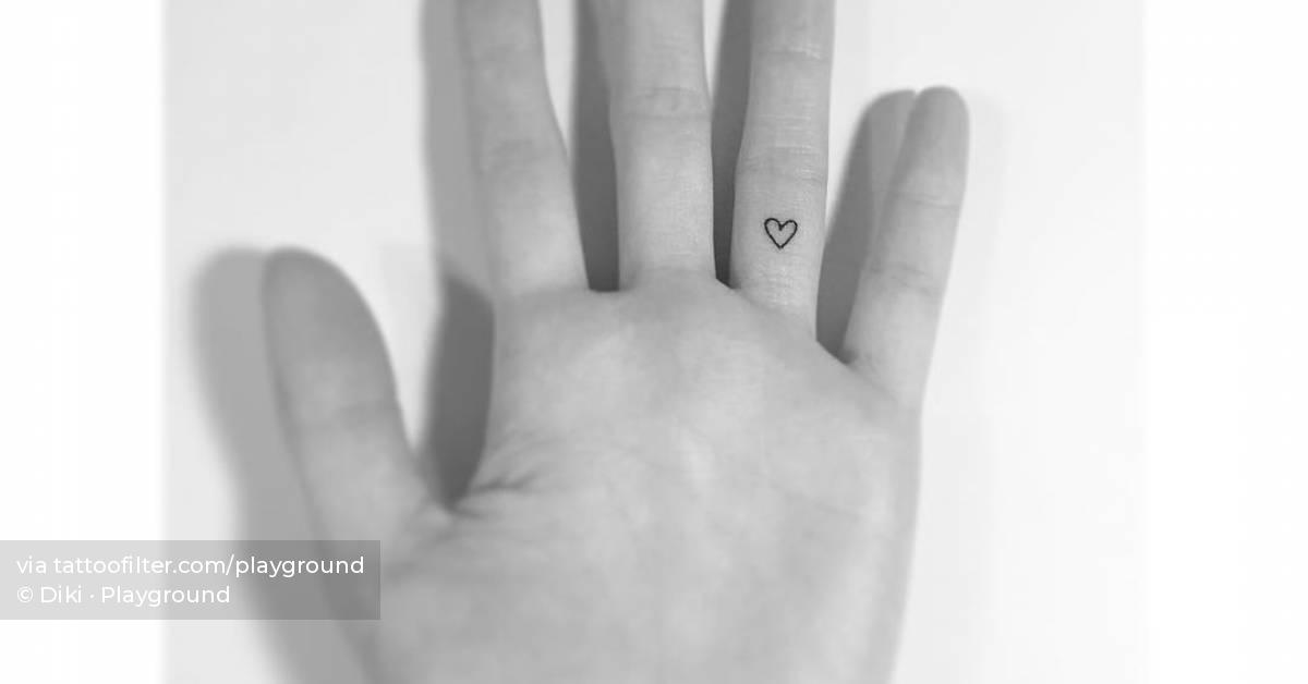 Heart tattoo located on the finger
