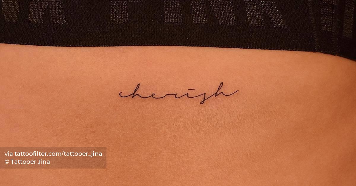 Tattoo that says "cherish" handwritten on the rib.