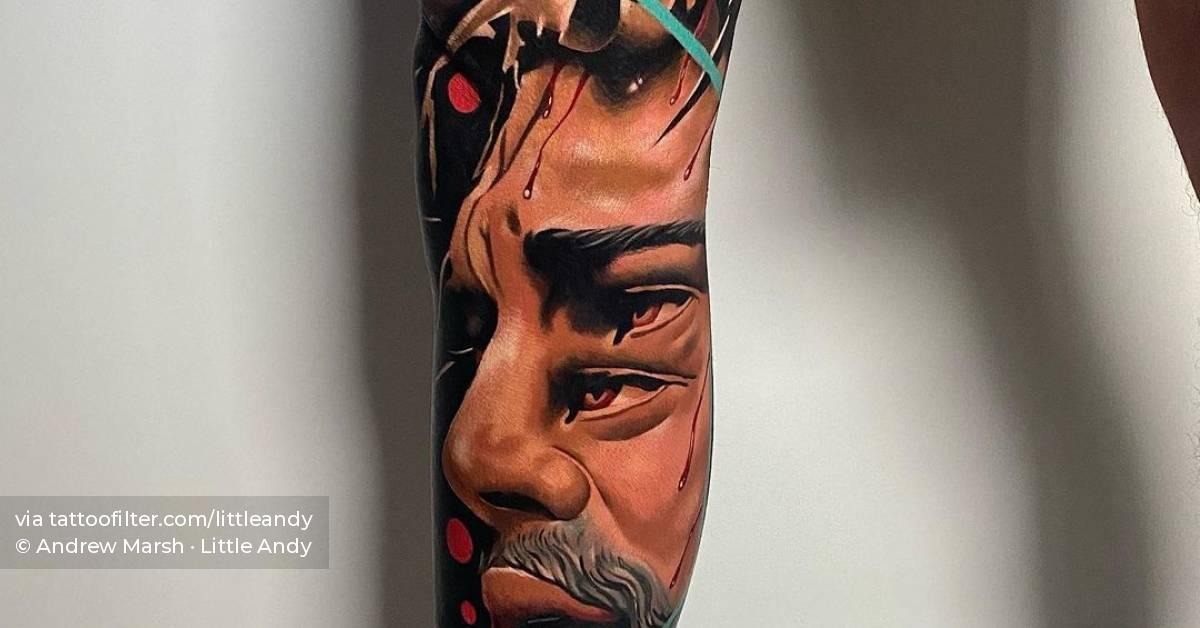 Surrealistic Jesus portrait leg sleeve tattoo.