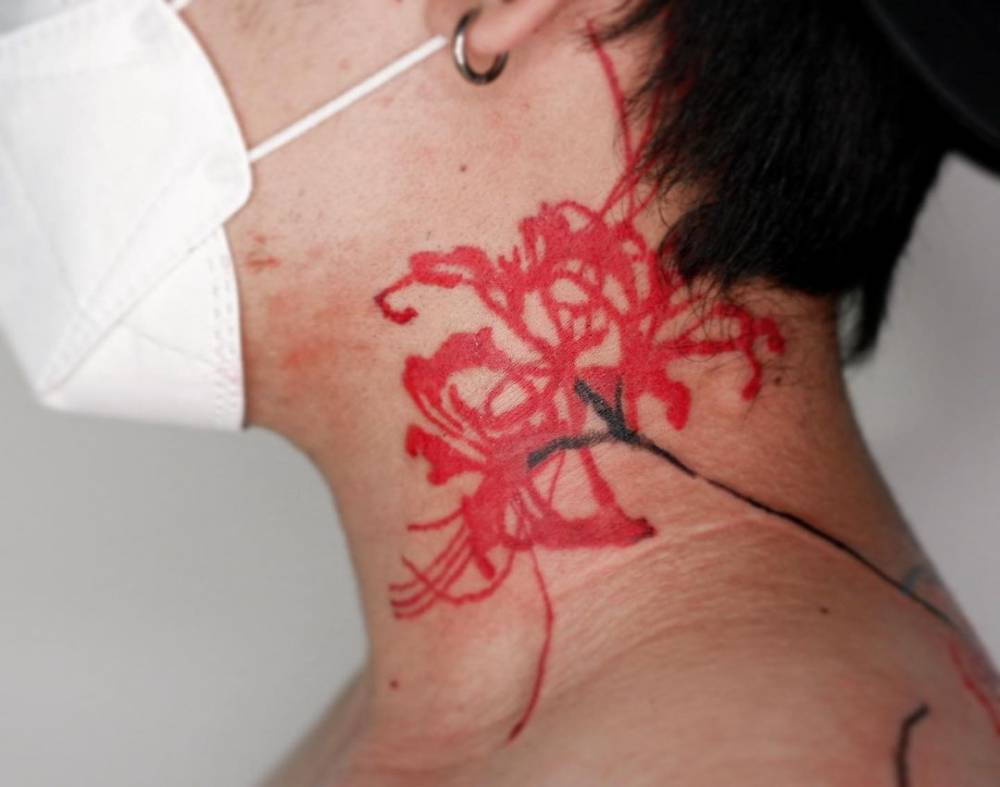 Red Spider Lily Tattoo Located On The Neck 