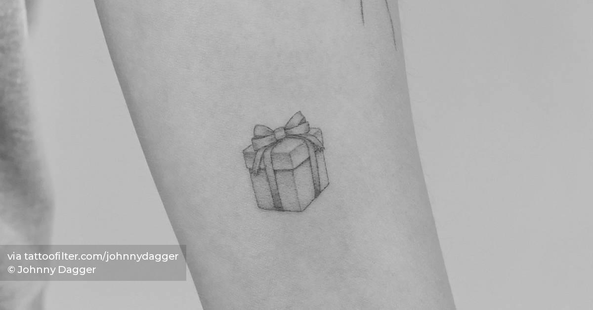 Single needle present box tattoo located on the inner