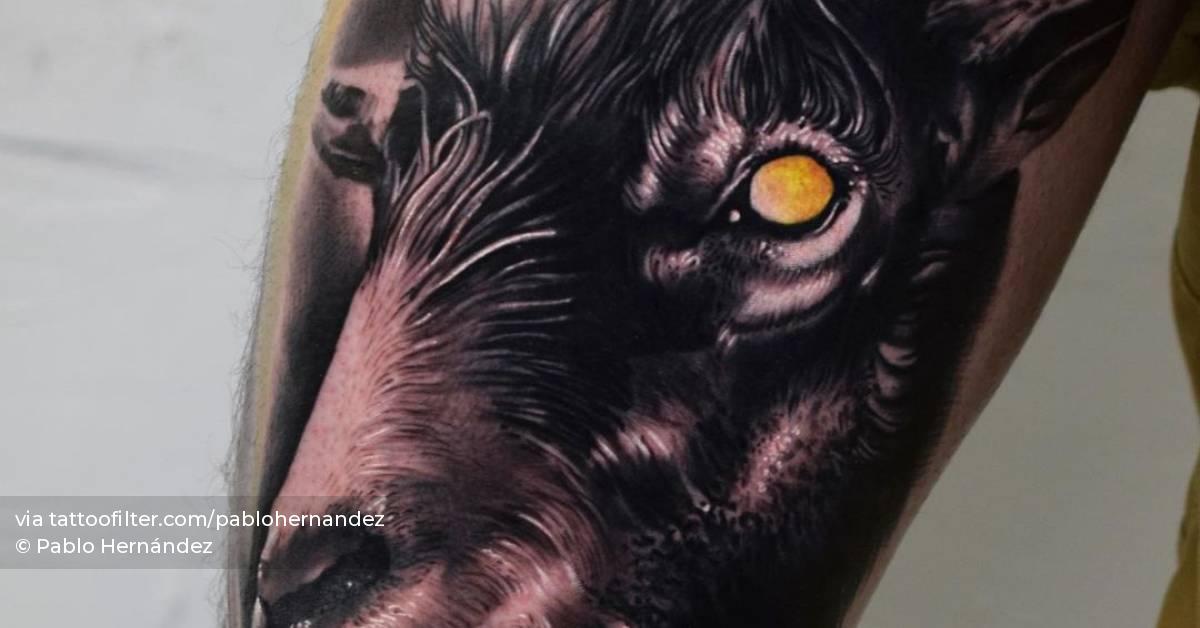 Realistic goat portrait tattoo on the thigh.