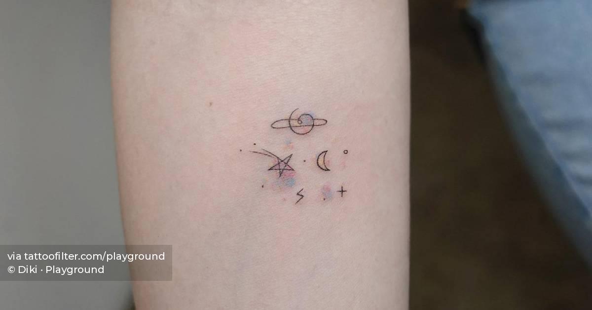 Minimalistic galaxy tattoo done on the inner forearm.