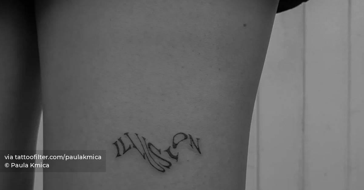 tattoo-of-the-word-illusion-located-on-the-thigh