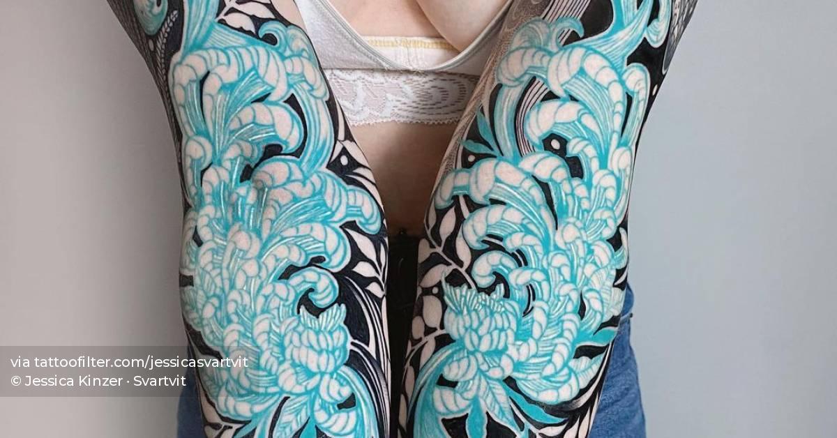 Individual matching chrysanthemums sleeve tattoos.