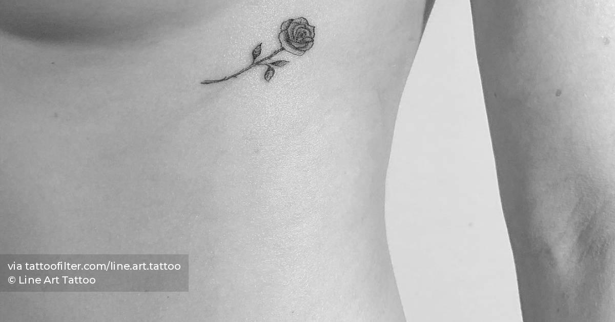 Rose tattoo located on the under boob.