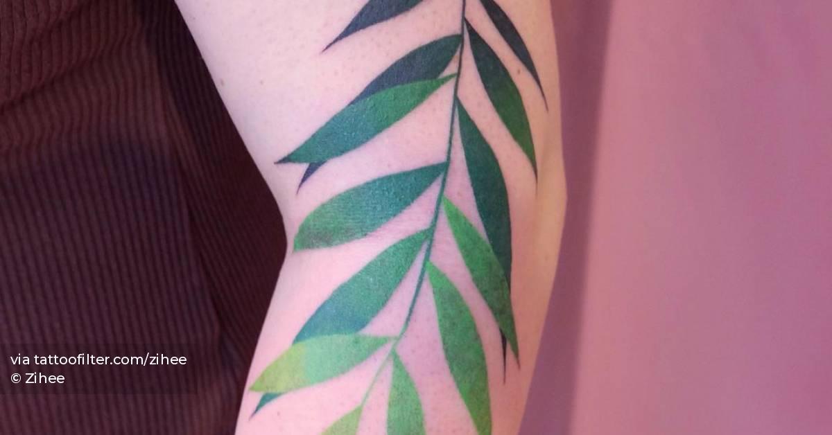 Palm Leaves Tattoo Located On The Forearm Illustrative palm-leaves-tattoo-located-on-the-forearm-illustrative