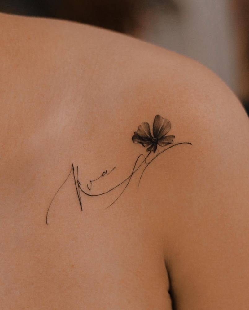KVA And Four Leaf Clover Tattoo Located On The KVA And Four Leaf Clover Tattoo Located On The