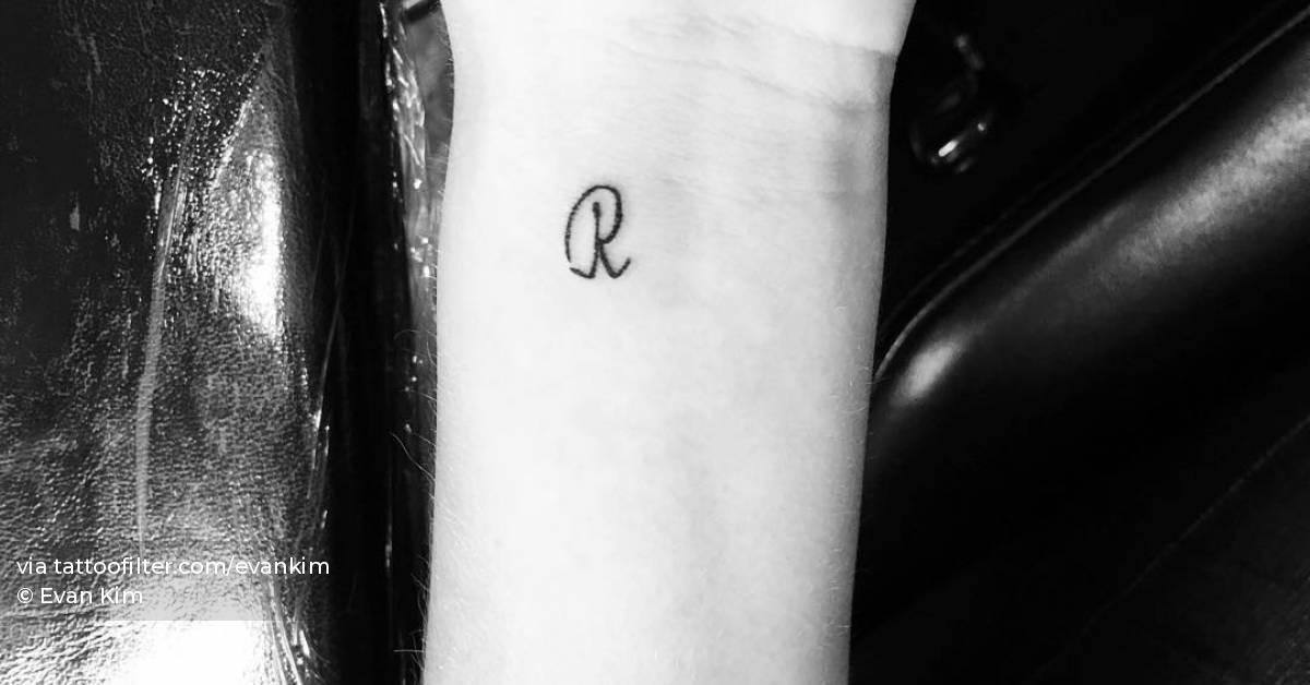 Tattoo of the letter 