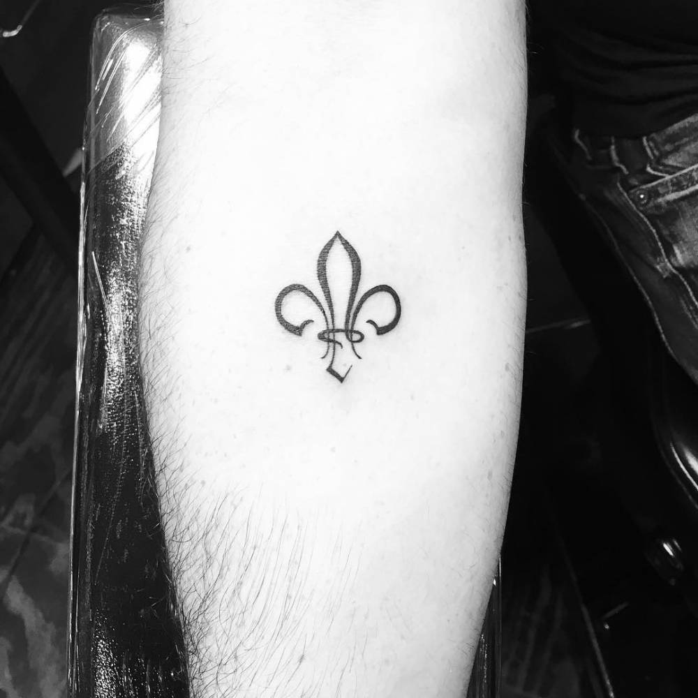 Minimalistic Style Fleur De Lis Tattoo Located On The Minimalistic Style Fleur De Lis Tattoo Located On The