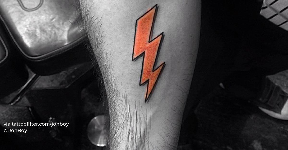 Lightning bolt tattoo located on the inner forearm.