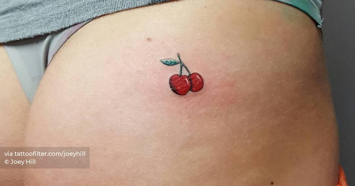 Cherry tattoo located on the butt cheek, illustrative