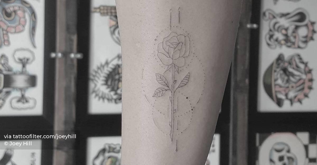 Single needle rose tattoo located on the wrist.