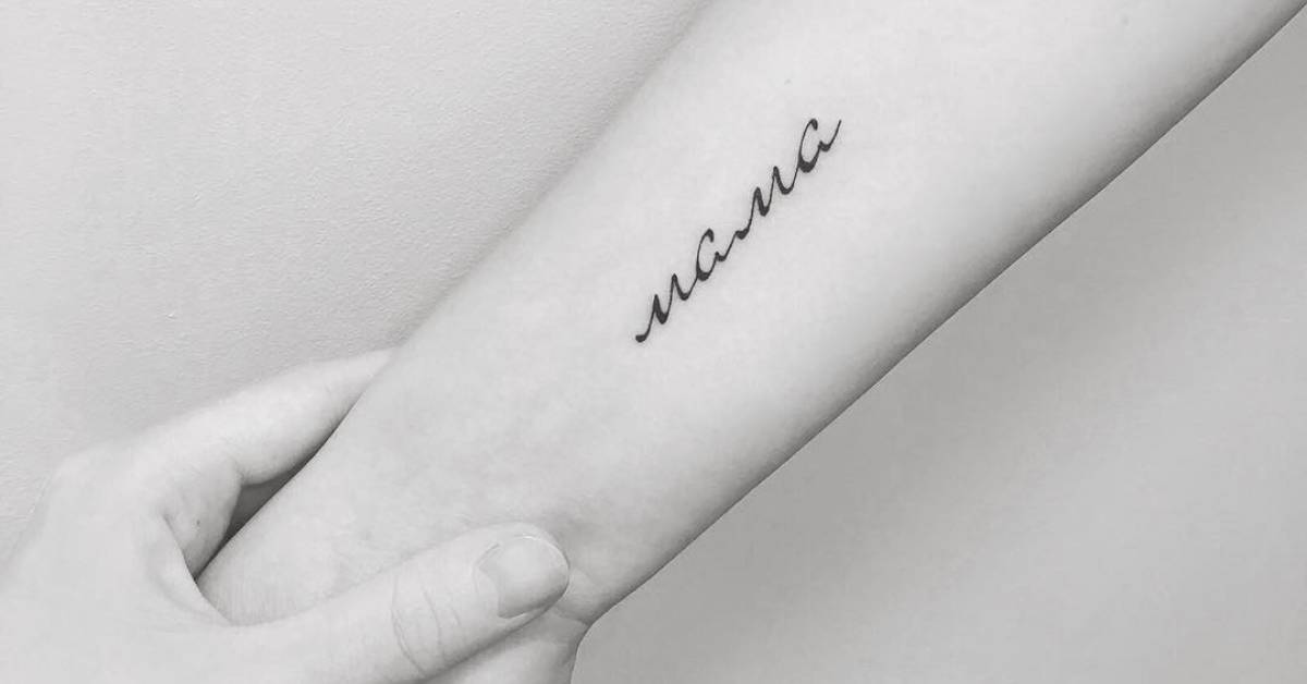 Tattoo of the word "mama" located on the wrist.