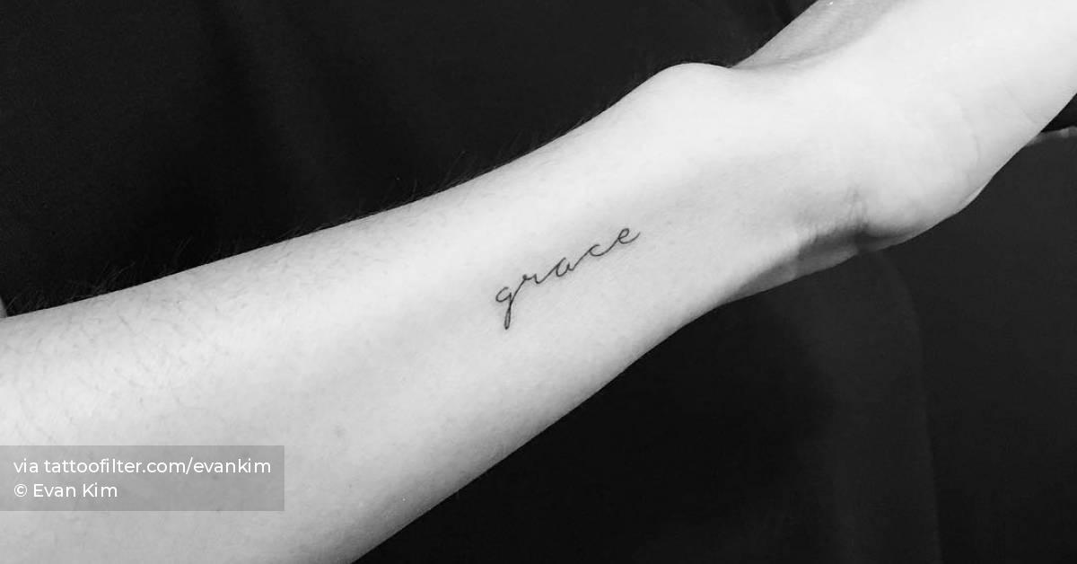 Tattoo of the word grace handwritten on the wrist 