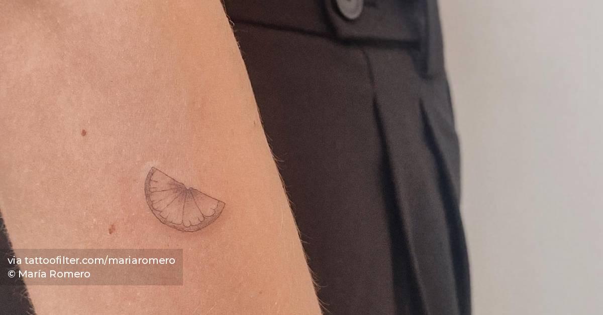 Fine Line Style Lime Slice Tattoo Done On The Forearm fine-line-style-lime-slice-tattoo-done-on-the-forearm