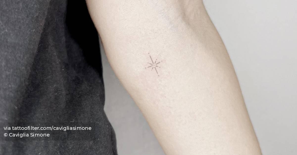Fine line style north star tattoo done on the inner