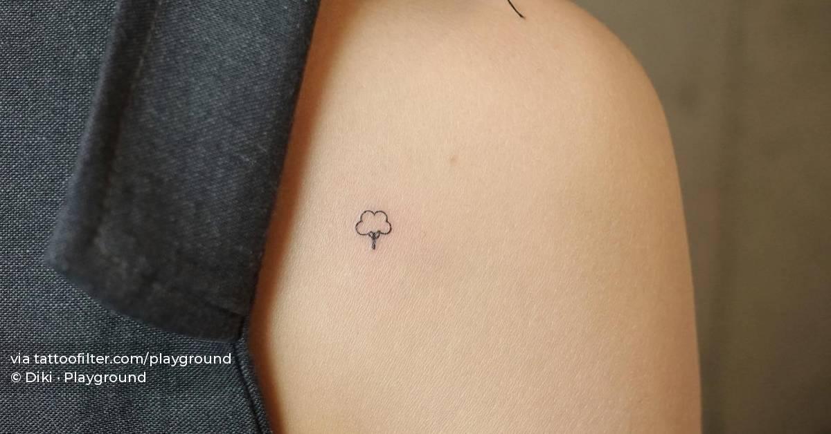 Tiny tree tattoo done on the shoulder blade 